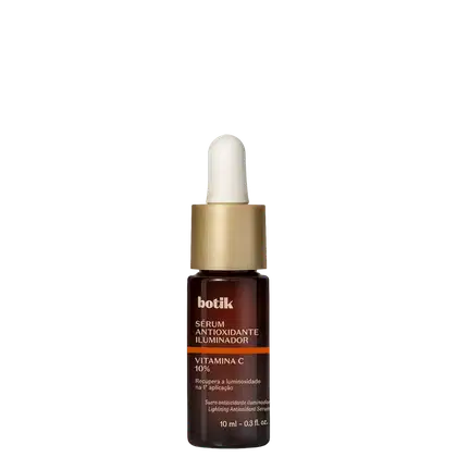 Frasco de vidro marrom com conta-gotas dourado contendo sérum antioxidante iluminador Botik com 10% de vitamina C. Rótulo em português indica recuperação da luminosidade na primeira aplicação.