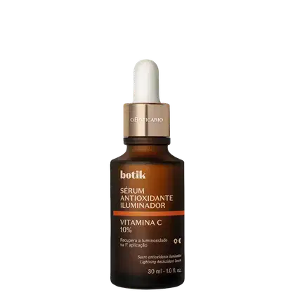 Frasco de vidro marrom com conta-gotas e rótulo dourado contendo "Botik Sérum Antioxidante Iluminador Vitamina C 10%". Produto promete recuperar a luminosidade na primeira aplicação.