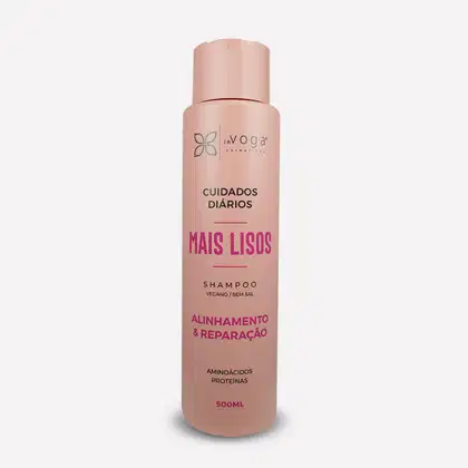Frasco rosa de shampoo In Voga Cuidados Diários, com rótulo destacando "Mais Lisos" e informações sobre alinhamento, reparação e aminoácidos proteicos. Produto vegano e sem sal, com 500ml de volume.