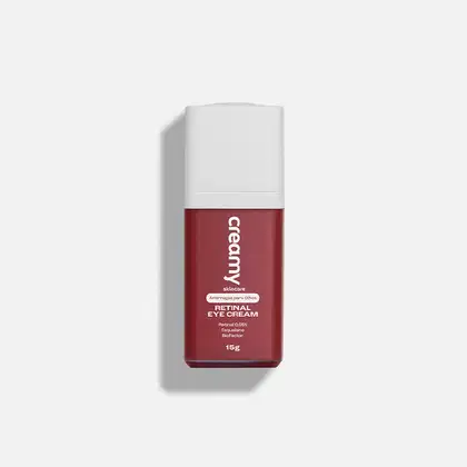 Frasco branco com tampa vermelha contendo o produto "Retinal Eye Cream" da marca Creamy. O rótulo vermelho destaca o nome do produto e a informação "Retinal 0.05%".