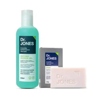 Frasco de gel de banho isotônico da marca Dr. Jones, com rótulo verde e azul, e caixa de sabonete em barra da mesma marca, em tons de cinza e amarelo.