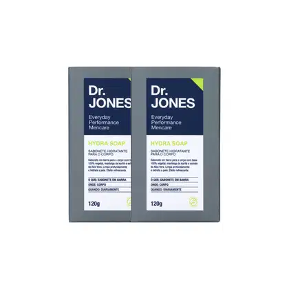 A imagem mostra dois sabonetes em barra da marca Dr. Jones. Os sabonetes são chamados "Hydra Soap" e têm 120g cada. As embalagens são retangulares, com fundo cinza e detalhes em azul e verde.