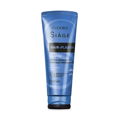 Frasco de shampoo da linha Siàge da Eudora, com embalagem azul e rótulo destacando "Hair-plastia", indicando tratamento para cabelos. O produto promete corrigir lesões do fio e hidratação tridimensional.