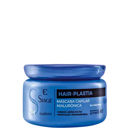 Frasco de máscara capilar hialurônica da marca Eudora, com embalagem azul e rótulo preto destacando o nome "Hair-plastia". O produto promete corrigir lesões do fio e hidratação tridimensional.