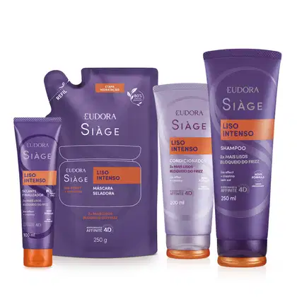 A imagem mostra um kit com quatro produtos, uma bisnaga pequena de leave-in, um refil de máscara capilar, uma bisnaga de condicionador e outra de shampoo. Todos com embalagem roxa, letras brancas, roxas e laranjas.
