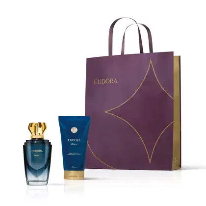 Conjunto de produtos da linha Royal da Eudora, incluindo um frasco de desodorante colônia masculino e uma loção corporal, além de uma sacola da marca de cor roxa com detalhes dourados.