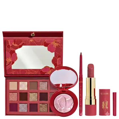Conjunto de produtos de maquiagem da marca Niina Secrets, incluindo uma paleta de sombras em tons de vermelho e rosa, um espelho compacto, um batom e um gloss labial, todos em embalagens vermelhas com detalhes florais.