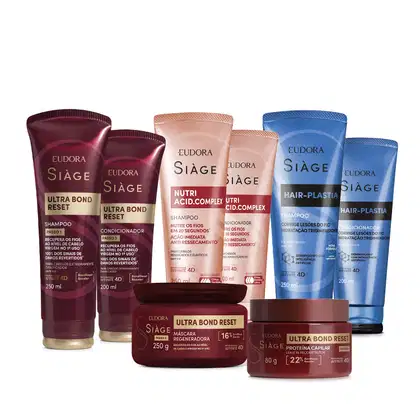 Produtos da linha Siàge da Eudora, incluindo shampoos, condicionadores, máscara regeneradora e proteína capilar, em embalagens de plástico com cores predominantes vermelho, rosa e azul.