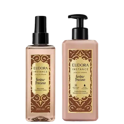 Dois produtos Eudora Instance Âmbar Precioso: Body Splash 200ml com spray e Creme Hidratante Desodorante Corporal 400ml com pump. Frascos em tons bege e rosa com rótulos dourados e marrom, design ornamental.