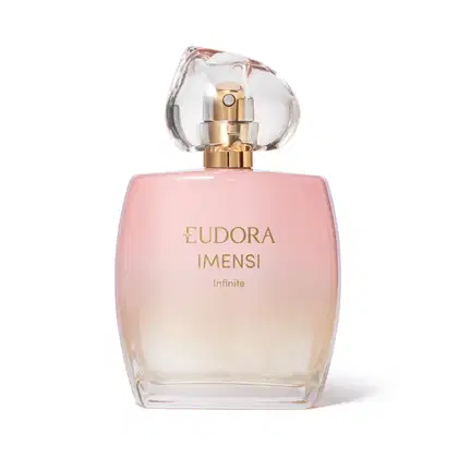 Frasco de vidro transparente degradê rosa claro. Tampa dourada com vidro em forma de pedra translúcida. Rótulo em letras douradas no contraste rosa.