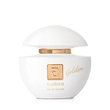Frasco arredondado de vidro branco opaco com tampa dourada. Rótulo branco com o logotipo da Eudora em dourado e a inscrição "Golden Eau de Parfum" também em dourado. Embalagem compacta e elegante, com detalhes metálicos dourados contrastando com o branco.