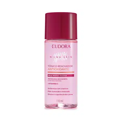 Frasco plástico transparente contendo líquido rosado. Tampa protetora na cor vinho. Embalagem com cores rosa e vinho, típicas da linha. Rótulo transparente com texto em rosa pink, quase vermelhor, e alaranjado. Nome da marca Niina Secrets em branco.