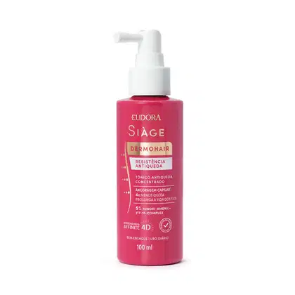 Frasco de 100 ml do produto Siàge Dermohair da Eudora, com bomba dosadora branca. O frasco possui cor rosa vibrante e rótulo com informações sobre os benefícios do produto para a resistência e antiqueda capilar.