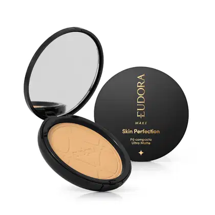 Pó compacto ultra matte da marca Eudora Make, com embalagem preta redonda e texto dourado "Skin Perfection" na tampa. 
