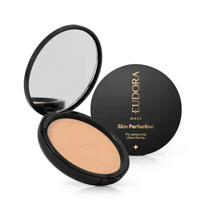 Pó compacto ultra matte da marca Eudora Make, com embalagem preta redonda e texto dourado "Skin Perfection" na tampa. 
