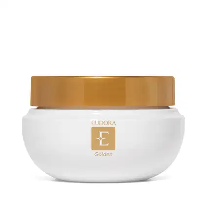 Frasco de creme hidratante branco com tampa dourada, exibindo o logotipo da marca Eudora Golden. O produto apresenta uma embalagem simples e elegante, com destaque para a cor dourada da tampa.