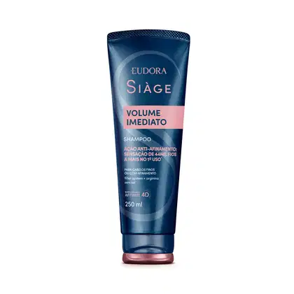 Frasco de shampoo da linha Siàge da Eudora, com volume de 250 ml, embalagem azul escuro com detalhes em rosa, destacando o "Volume Imediato" como principal benefício do produto.