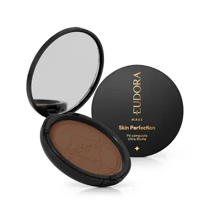 Pó compacto ultra matte da marca Eudora Make, com embalagem preta redonda e texto dourado "Skin Perfection" na tampa.