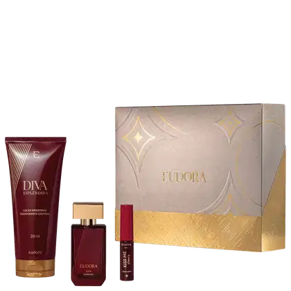 Kit Diva Esplendida Eudora contém loção hidratante 200ml em frasco vermelho, perfume em frasco quadrado vermelho com tampa dourada e gloss labial cherry. Embalagem luxuosa bege e dourada.