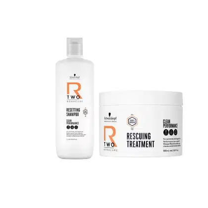 Dois frascos de produtos Schwarzkopf Professional para cabelos: um frasco branco com rótulo laranja e texto "Resetting Shampoo", e um pote branco com rótulo laranja e texto "Rescuing Treatment".
