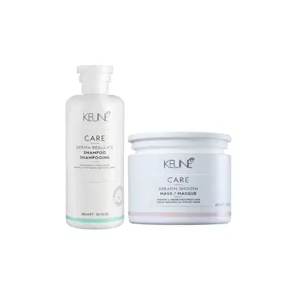 Dois produtos da linha Keune Care: um frasco de shampoo Derma Regulate e um pote de máscara Keratin Smooth, ambos em embalagens brancas com detalhes em verde e rosa, exibindo o logotipo da marca.