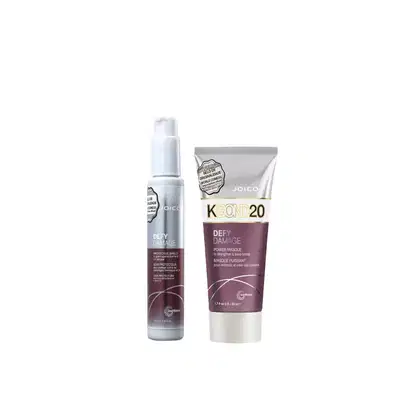 Dois produtos Joico: um frasco branco de Defy Damage Protective Shield e um tubo cinza de Kbond20 Defy Damage Power Masque, ambos com rótulos e embalagens característicos da marca.