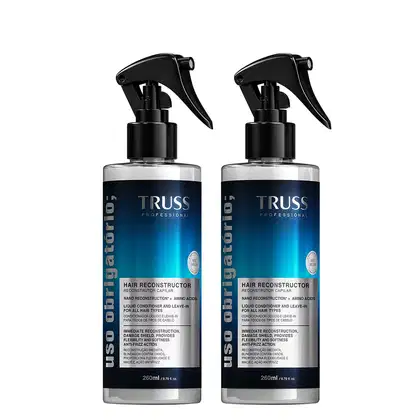Dois frascos de 260ml do Reconstructor Capilar da linha Truss Professional, com embalagem preta e azul, apresentando rótulo com informações sobre o produto e seu uso.