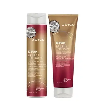 Dois produtos da marca Joico: um frasco de shampoo protetor de cor K-Pak Color Therapy e um tubo de tratamento protetor de cor K-Pak Color Therapy, ambos com embalagens em tons de dourado e vermelho.