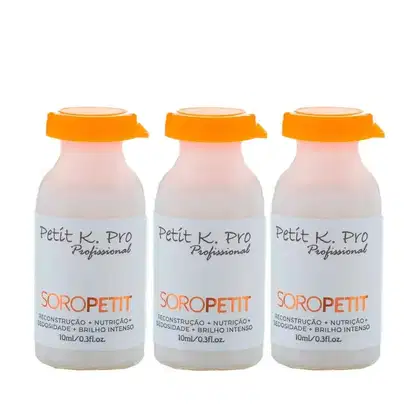 Três frascos de vidro translúcidos com tampas laranja da linha Soropetit da marca K.Pro Professional, contendo 10ml de produto cada. Os rótulos indicam que se trata de um tratamento de reconstrução, nutrição e brilho intenso.