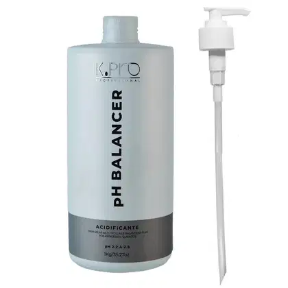 Frasco de produto profissional de beleza da marca K.pro, com rótulo indicando "PH BALANCER" e "ACIDIFICANTE" para ajuste do pH. Embalagem branca com bomba dosadora.