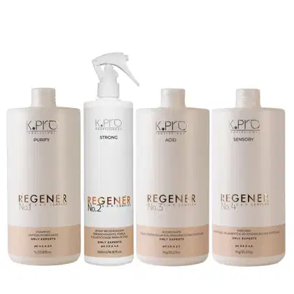 Quatro frascos e embalagens de produtos de beleza da marca K.pro, incluindo shampoo, spray regenerador, acidificante e máscara.As embalagens são predominantemente brancas com detalhes em dourado.