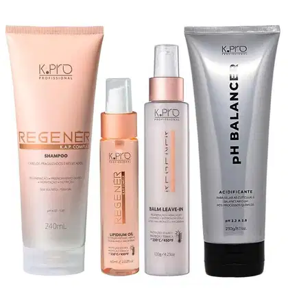 Conjunto de produtos de cuidados capilares da marca K.pro, incluindo shampoo, leave-in e óleo capilar em embalagens de plástico nas cores rosa e branco. Também conta com tubo de acidificante pH Balancer.