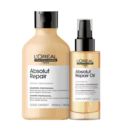 Um frasco de shampoo Absolut Repair e um frasco de óleo Absolut Repair Oil. O shampoo tem embalagem plástica transparente com rótulo preto e branco. O óleo tem embalagem plástica transparente com rótulo dourado e preto.