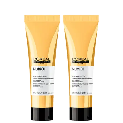 A imagem mostra dois tubos idênticos do leave-in da linha NutriOil da L'Oréal Professionnel. Os tubos possuem uma cor bege/dourado e detalhes em preto na parte inferior, trazendo o logotipo e informações sobre o produto em inglês e português.