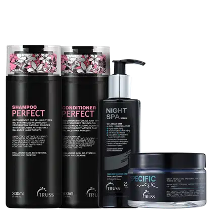 Na imagem dois frascos de shampoo e condicionador Perfect, com embalagens pretas e detalhes florais em rosa. Um frasco de sérum Night Spa. Um pote de máscara capilar Specific.