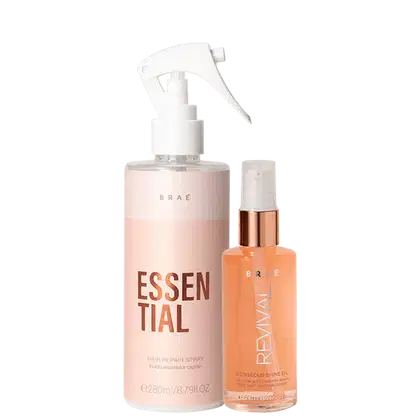 Produtos de cuidado capilar da marca Braé. Um frasco spray branco com a inscrição "Essential" em letras grandes e cor rosa. Ao lado, um frasco menor transparente com líquido alaranjado, com o rótulo "Revival".