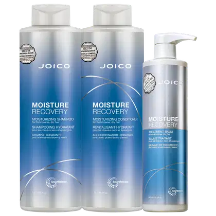 Produtos Joico para cabelos grossos e secos. Dois frascos grandes de shampoo e condicionador. Um frasco menor de bálsamo de tratamento da mesma linha. Todos com rótulos destacando o selo de originalidade da marca e o nome "Joico" em letras maiúsculas.