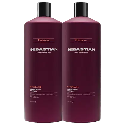 Dois frascos de shampoo da marca Sebastian Professional, na cor vinho escuro, com rótulos destacando o nome da marca e o nome do produto "Penetraitt Rescue Repair Shampoo".