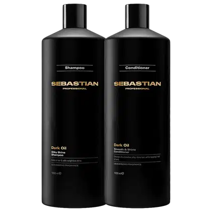 Dois frascos pretos da marca Sebastian Professional, um de shampoo e outro de condicionador da linha Dark Oil, com rótulos em dourado destacando o nome da marca e o tipo de produto.
