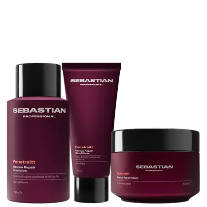Três produtos da marca Sebastian Professional: um frasco de shampoo Penetraitt Rescue Repair, um tubo de condicionador Penetraitt Rescue Repair e um pote de máscara Penetraitt Rescue Repair, todos em embalagens de cor vinho com detalhes em laranja.