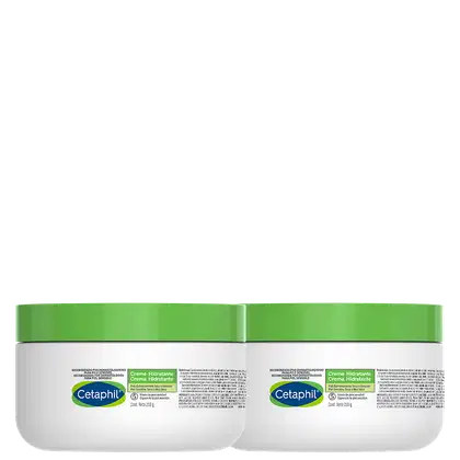 Dois potes de creme hidratante Cetaphil, com embalagem verde e branca, contendo 229g cada. O rótulo destaca o nome da marca e a indicação de ser um produto recomendado por dermatologistas para pele sensível.