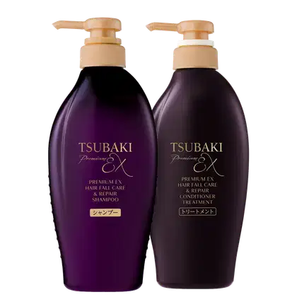 Dois frascos de shampoo e condicionador da linha Tsubaki Premium EX, com embalagens de plástico de cor roxa escura e detalhes dourados, com 250ml cada