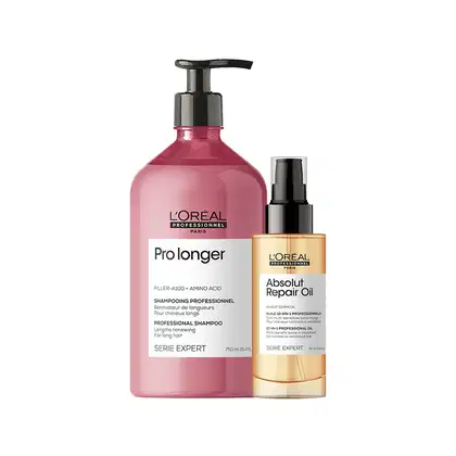 O produto de beleza da L'Oréal Professionnel consiste em um frasco rosa de shampoo Pro Longer e um frasco dourado de óleo reparador Absolut Repair Oil, ambos da linha Serie Expert.