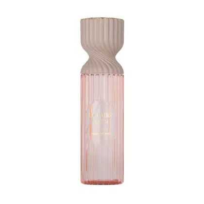 Frasco de perfume Lattafa Eclaire, com design ondulado em tons de rosa, contendo texto em árabe e inglês indicando o nome do produto "Perfume Mist".