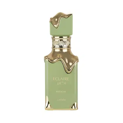 Frasco de perfume Eclaire da marca Lattafa, com design dourado e verde claro, contendo a fragrância de pistache. O frasco possui formato geométrico com detalhes ondulados e tampa dourada.