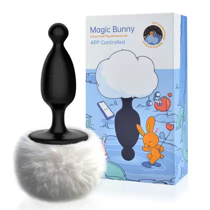 Plug anal com formato de coelho, chamado "Magic Bunny", controlado por aplicativo. O produto é composto por uma parte preta em formato de gota e uma parte branca e felpuda, simulando a cauda de um coelho.