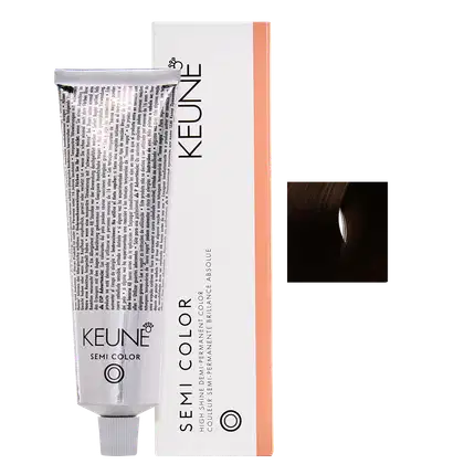 Caixa branca e tubo de tinta de cabelo da marca Keune Semi Color, com texto em preto