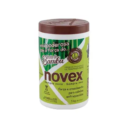 A imagem mostra o creme de tratamento "Broto de Bambu" 1kg da marca Novex Embelleze. Traz a informação de força e crescimento para cabelos enfraquecidos. O pote é cilíndrico, na cor verde e branca.