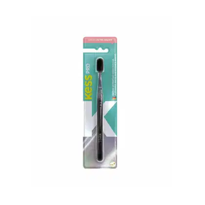Escova dental Kess Pro com cerdas extra macias, embalada em cartela plástica de cor verde e rosa. O produto apresenta o nome da marca "Kess Pro" em destaque.