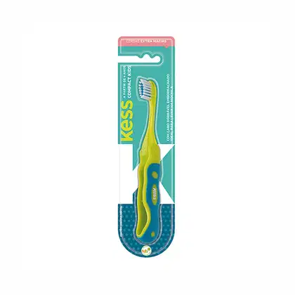 Escova de dentes Kess compacta, com cabo em tons de verde e azul, embalagem com informações sobre as características do produto.